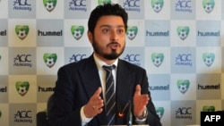 FILE - Secretary general of the Afghanistan Football Federation (AFF) Sayed Alireza Aqazada speaks during a press conference in Kabul, Dec. 1, 2018. Several AFF officials have been accused of sexual misconduct by female football players.