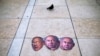 FILE - Masks depicting Israeli Prime Minister Benjamin Netanyahu and Israeli Defense Minister Benny Gantz lay on the ground during a protest against sending the country to its fourth elections in two years, in Tel Aviv, Dec. 2, 2020.