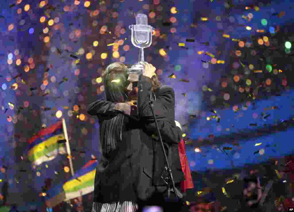 Salvador Sobral from Portugal, right, embraces his sister Luisa after performing the song &quot;Amar pelos dois&quot; following his win in the Final of the Eurovision Song Contest in Kyiv, Ukraine, May 13, 2017.
