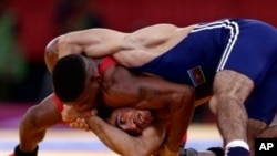 Wrestling has passed the first test to get back on the schedule for the 2020 Olympic Games. 