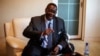 Malawian presidential candidate Peter Mutharika, brother of the late president Bingu wa Mutharika, gestures during a press conference at his residence in Blantyre, Malawi, May 22, 2014.