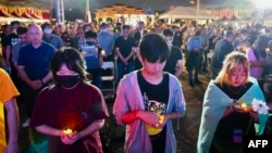 资料照片: 2024年6月4日人们在台北自由广场参加纪念1989年天安门镇压35周年集会