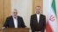 Palestinian group Hamas' top leader, Ismail Haniyeh and Iran's Foreign Minister Hossein Amir Abdollahian attend a press conference in Tehran
