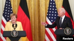 Tổng thống Mỹ Joe Biden nói về Cuba khi họp báo chung với Thủ tướng Đức Angela Merkel, 15/7/2021.