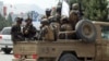 FILE - Taliban special forces arrive at Kabul's airport, Aug. 31, 2021. A 2022 Pentagon report confirmed that the fall of the Afghan government gave the Taliban access to more than $7 billion worth of U.S. military equipment.