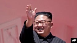 FILE - In this Sunday, Sept. 9, 2018 file photo, North Korean leader Kim Jong Un waves after a parade for the 70th anniversary of North Korea's founding day in Pyongyang, North Korea. North Korea says leader Kim has observed a successful testing of…