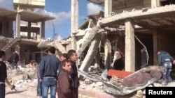 Family members of passengers missing on the overturned South Korean ferry Sewol react at the port in Jindo.