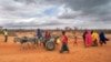 FILE - People arrive at a displacement camp on the outskirts of Dollow, Somalia, Sept. 20, 2022.