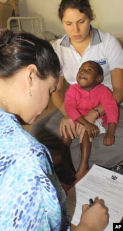 Physiotherapist Laura Grobicki (back) says most of her patients are infected with HIV, and become disabled as a result