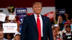 President Donald Trump arrives to speak at a rally at Aaron Bessant Amphitheater, May 8, 2019, in Panama City Beach, Fla.