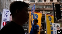 香港2023年12月10日举行了新规则下“仅限爱国者”参与的区议会选举。（美联社）