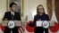 U.S. Secretary of State Hillary Clinton (R) holds a joint news conference with Japan's Foreign Minister Fumio Kishida after their meeting at the State Department in Washington, January 18, 2013.