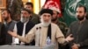FILE - Former Afghan warlord Gulbuddin Hekmatyar speaks to supporters in Jalalabad province, Afghanistan, April 30, 2017. Hekmatyar cautions that a fall of President Ashraf Ghani’s administration would result in Kabul being overrun by the Taliban.