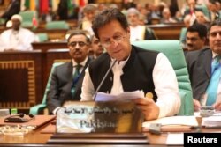 Pakistani Prime Minister Imran Khan attends a summit meeting of the 57-member Organization of Islamic Cooperation (OIC) in the Saudi holy city of Mecca, June 1, 2019.