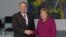 Mike Pompeo akiwa na Angela Merkel, mjini Berlin 