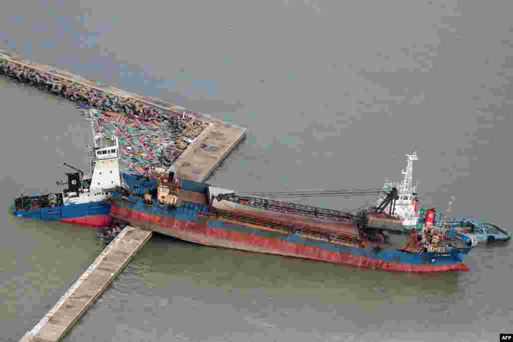 An aerial view from a Jiji Press helicopter shows a ship that collided with a breakwater due to strong winds caused by typhoon Jebi in Nishinomiya city, Hyogo prefecture, Japan.