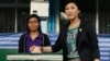 Thai Prime Minister and Pheu Thai party leader Yingluck Shinawatra poses before casting her ballot in the general election at a polling station in Bangkok, Thailand, Feb. 2, 2014.