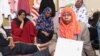 Families describe torture, rapes and kidnappings on the road from their homes in Sudan to Libya on May 4, 2019, in Tripoli, Libya. (Heather Murdock/VOA) 