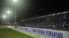 People gather for the soccer match between Hodan and Waberi districts, Mogadishu's first night game in 30 years, at Konis Stadium in Modadishu, Somalia, Sept. 8, 2017.