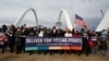 U.S. civil rights activists hold a Peace Walk on the Frederick Douglass Memorial Bridge to urge Democrats to pass a law protecting voting rights, during Martin Luther King Jr. Day, in Washington, Jan. 17, 2022.