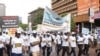 Government officials participate in the anti-corruption walk in Kampala, Uganda, Dec. 4, 2019. (Halima Athumani/VOA News)