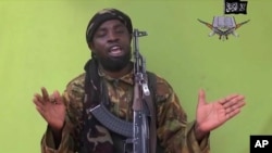 FILE - Photo taken from video by Nigeria's Boko Haram terrorist network, and shows their leader Abubakar Shekau.