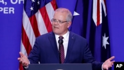 Australian Prime Minister Scott Morrison speaks alongside President Donald Trump during a joint visit to mark the opening of an Australian-owned Pratt Industries plant, Sept. 22, 2019, in Wapakoneta, Ohio.