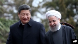 伊朗总统鲁哈尼欢迎到访的中国国家主席习近平（2016年1月23日）