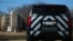 FILE - A police vehicle sits outside of the Congregation Beth Israel Synagogue in Colleyville, Texas, some 25 miles (40 kilometers) west of Dallas, Jan. 16, 2022.