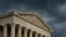 FILE - The Supreme Court building is seen under stormy skies in Washington, June 20, 2019.