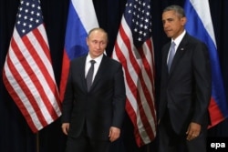 U.S. -- Russian President Vladimir Putin (L) and US President Barack Obama (R) pose for photographs before the start of a bilateral meeting at the United Nations headquarters in New York City, New York, USA, 28 September 2015.