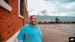 Thommy Hill stands outside the Cabell County/Huntington Health Department, where he works in the harm reduction program, in Huntington, W.Va., Dec. 5, 2018. Drug overdose deaths, while still a crisis, have started to decline in the U.S.