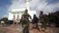 Soldiers serving in the African Union Mission in Somalia patrol outside a Mosque during Eid al-Fitr prayers, marking the end of the fasting month of Ramadan, in Mogadishu, July 17, 2015.