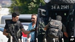 A red panda is pictured in cherry blossom at Manor Wildlife Park in St. Florence, Wales, Britain.