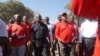 MCP leader Lazarous Chakwera (in black) and UTM leader Saulos Chilima (in red) were also taking part in protests against last May election results. (Lameck Masina/VOA)