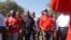 MCP leader Lazarous Chakwera (in black) and UTM leader Saulos Chilima (in red) were also taking part in protests against last May election results. (Lameck Masina/VOA)