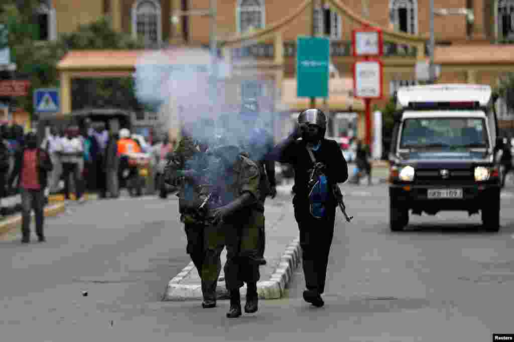 Riot policemen fire tear gas to disperse supporters of Kenya's opposition National Super Alliance (NASA) coalition during a protest in Nairobi.