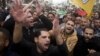 Palestinian mourners carry the body of Ibrahim Skafi, 22, during his funeral in the West Bank city of Hebron, Thursday, Nov. 5, 2015. President Obama will host Israeli Prime Minister Benjamin Netanyahu at the White House on Monday.