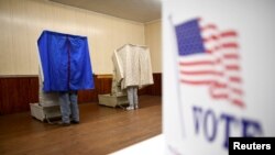 FILE - Voters across the United States cast their ballots in state and local elections on Nov. 5, 2019, electing two Somali American women to city council seats in Minnesota and Maine.