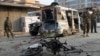 阿富汗保安部队士兵在贾拉拉巴德的自杀炸弹袭击现场。（2017年12月3日）