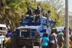 Malawi police provide security as women march in Blantyre, July 10, 2019. (Lameck Masina)