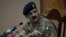 FILE - Pakistan's army spokesman Major-General Asim Bajwa briefs the media about a Taliban attack on a school in Peshawar, Pakistan, Dec. 16, 2014.