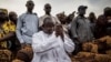 Adama Barrow, the flag-bearer of the coalition of the seven opposition political parties in Gambia, greets supporters during a gathering in the Buffer Zone district of Talinding, Nov. 29, 2016, on the last day of the presidential campaign in Gambia.