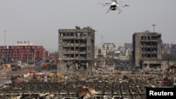 中国武警无人机查看天津爆炸现场