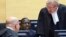 Kenyan Deputy President William Ruto (C) sits in the courtroom of the International Criminal Court in The Hague, May 14, 2013.