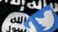 FILE - A 3-D printed logo of Twitter and an Islamic State flag are seen in this picture illustration taken Feb. 18, 2016. Radicals in the West "use colleges, mosques, media outlets and social media sites to radicalize people,” 