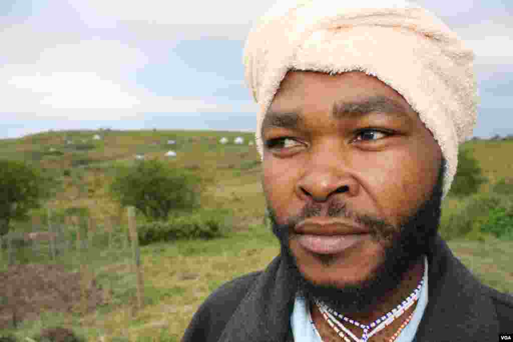 Village sangoma, or traditional healer, Zwelisithile Bendlela, says evil spirits cause “mental problems” (VOA/Taylor)