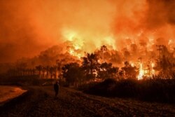 រូប​ឯកសារ៖ ភ្លើង​ឆេះ​ព្រៃ​នៅ​ក្រុង​ប្រទេស​ក្រិក​កាល​ពី​ថ្ងៃ​ទី​១៩ ខែ​ឧសភា ឆ្នាំ​២០២១។