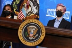 U.S. Women’s National Soccer Team players Purce and Rapinoe join U.S. President Biden and the first lady for an Equal Pay for women proclamation at the White House in Washington.
