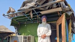 Many elderly farmers have lived on the highway for nearly a year. (VOA/Anjana Pasricha)